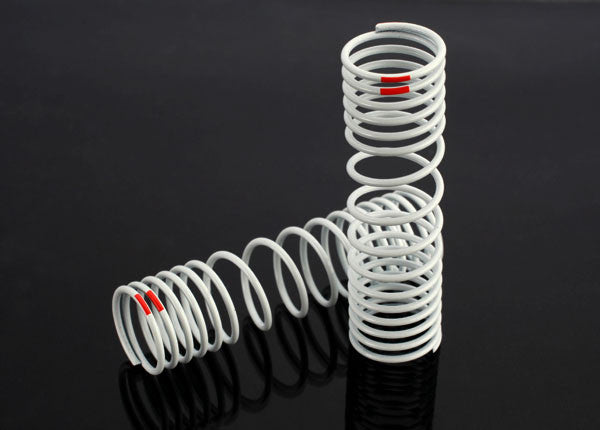 TRAXXAS 6865 Springs, rear (progressive, -20% rate, orange) (2) : SLASH 4X4, STAMPEDE 4X4