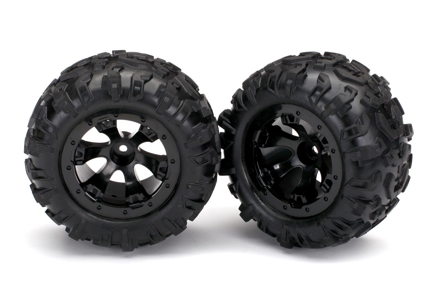 TRAXXAS 7277 Tires & wheels, assembled, glued (Geode black, beadlock style wheels, Canyon AT tires, foam inserts) (1 left, 1 right)