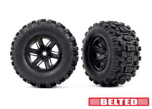 TRAXXAS 7871 Tires & wheels, assembled, glued (X-Maxx® black wheels, Sledgehammer® belted tires, dual profile (4.3" outer, 5.7" inner), foam inserts) (left & right)