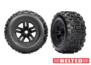 TRAXXAS 9573 Tires & wheels, assembled, glued (3.8" black wheels, belted Sledgehammer® tires, foam inserts) (2)
