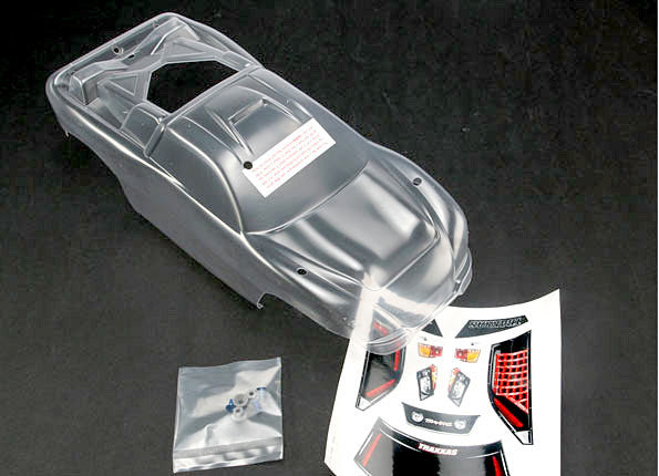 TRAXXAS 4412 Body, Nitro Rustler (clear, requires painting)/window, grill, lights decal sheet/ wing and aluminum hardware