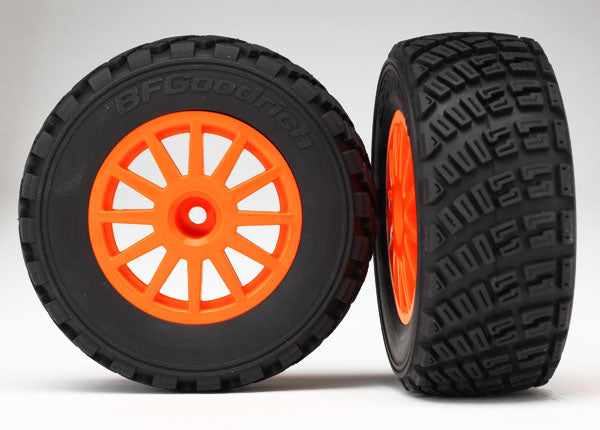 TRAXXAS 7473A Tires & wheels, assembled, glued (orange wheels, gravel pattern tires, foam inserts) (2) (TSM® rated)