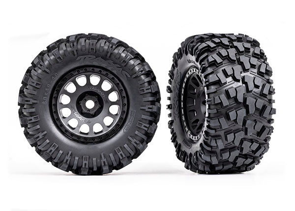 TRAXXAS 7875 Tires & wheels, assembled, glued (XRT® Race black wheels, Maxx® AT tires, foam inserts) (left & right)