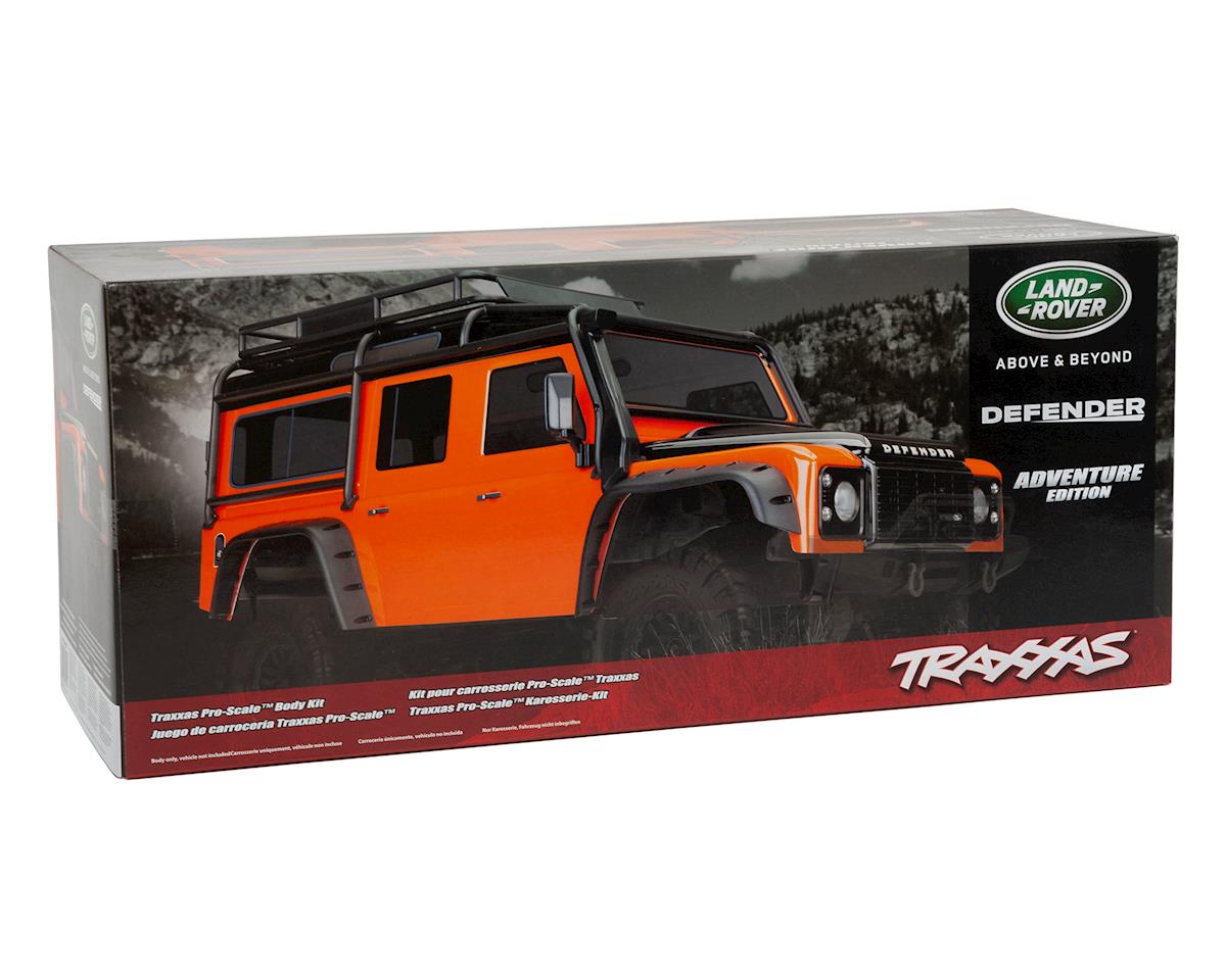 TRAXXAS 8011A Body, Land Rover Defender, adventure orange (complete with ExoCage, inner fenders, fuel canisters, and jack)