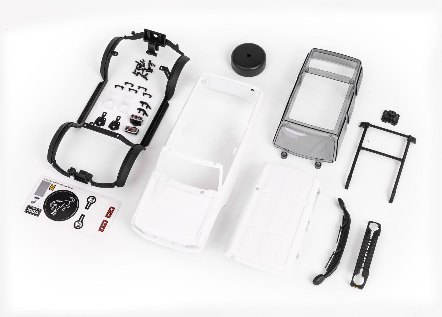 TRAXXAS 9711 Body, Ford Bronco, complete (unassembled) (white, requires painting) (includes grille, side mirrors, door handles, fender flares, windshield wipers, spare tire mount, & clipless mounting)