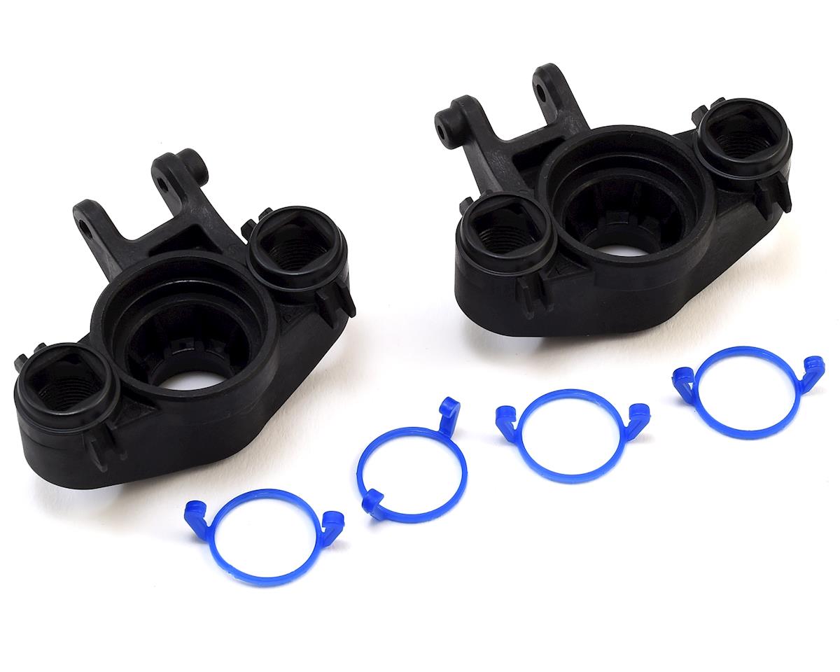 TRAXXAS 8635 Axle carriers, left & right (1 each) (use with 8x16mm & 17x26mm ball bearings)/ dust boot retainers (4)